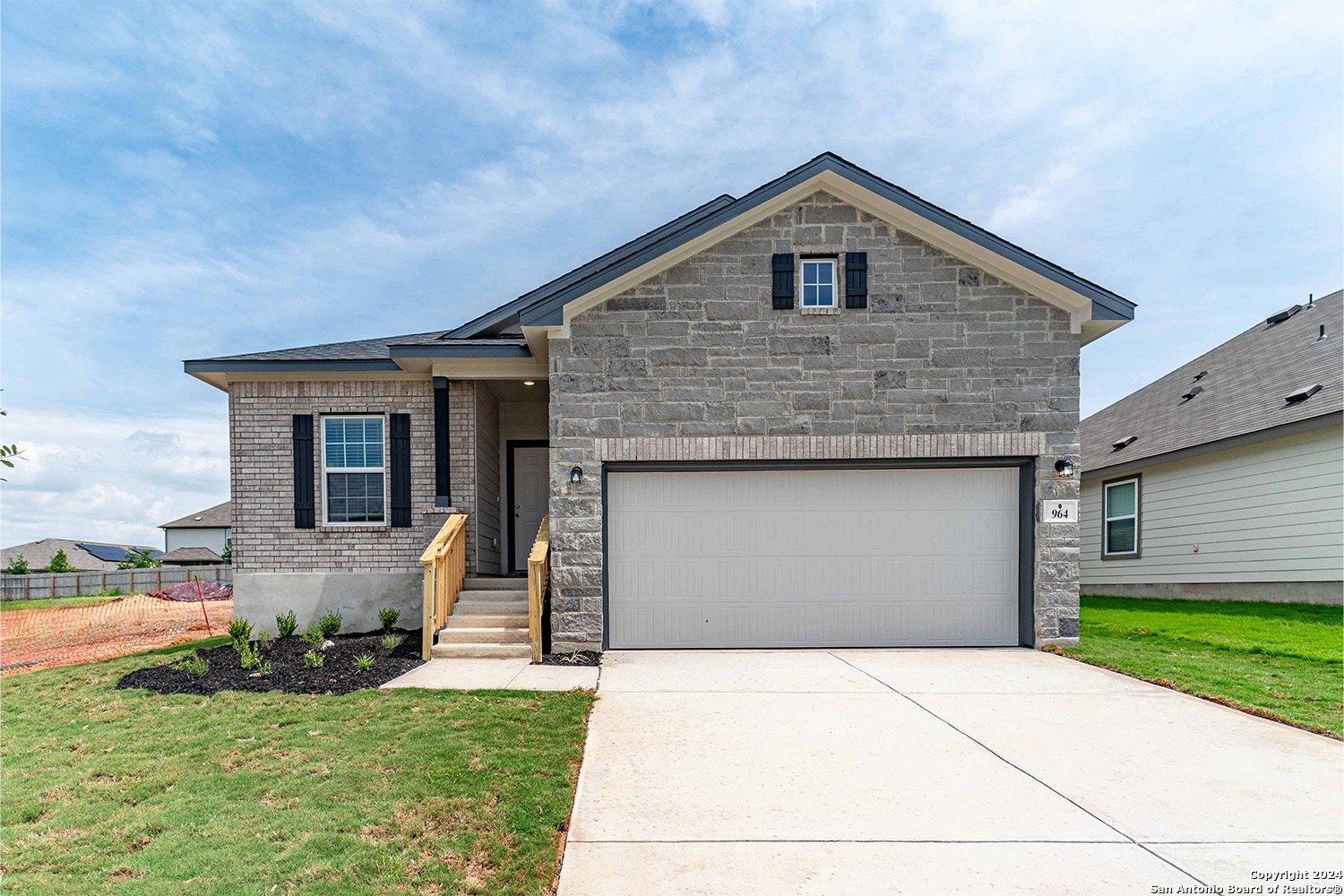 a front view of house with yard