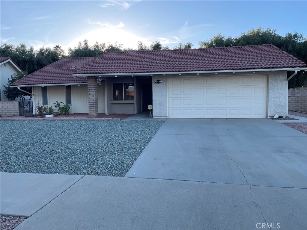 a front view of a house with yard