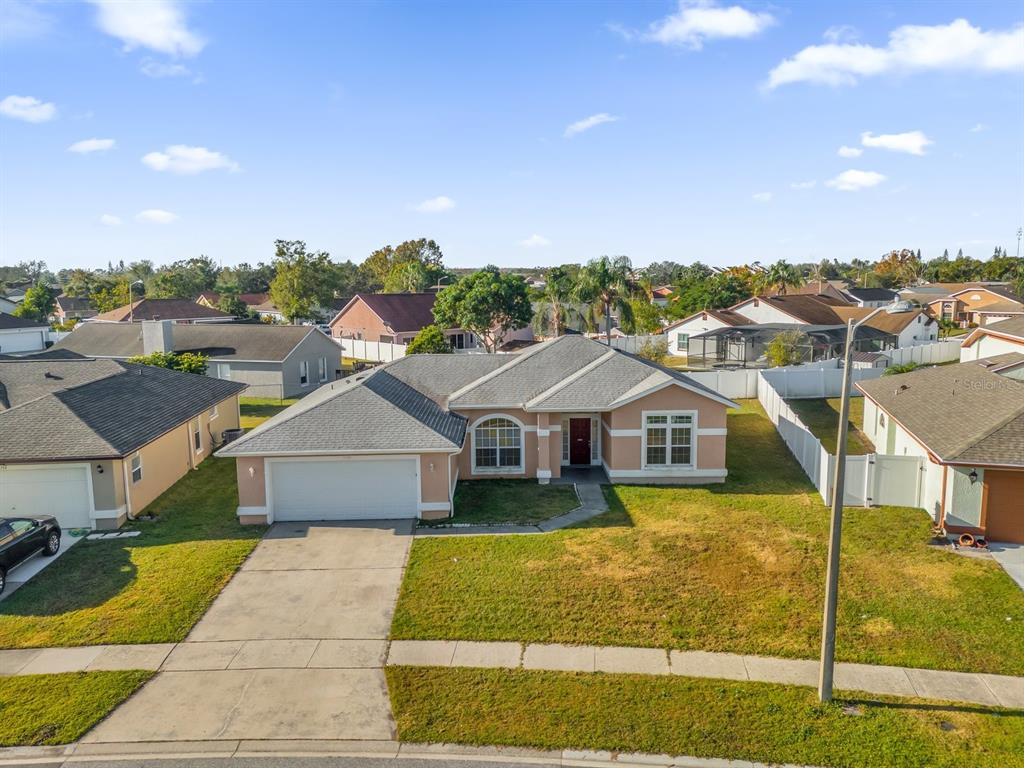 a view of a house with a big yard