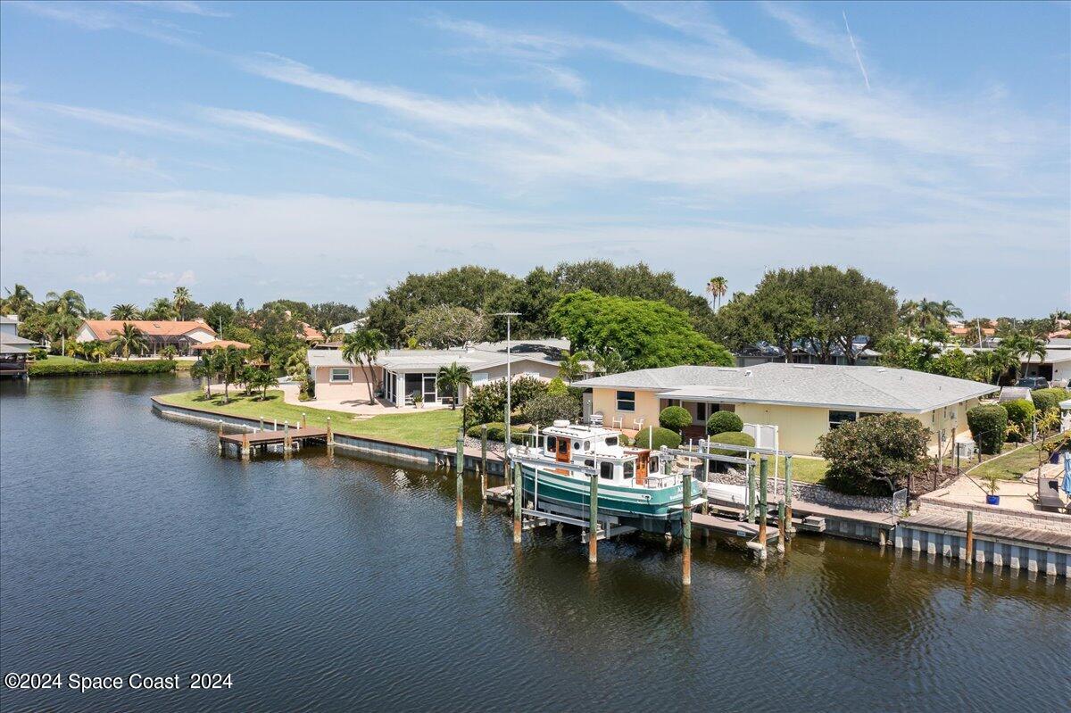 a view of a lake with outdoor seating