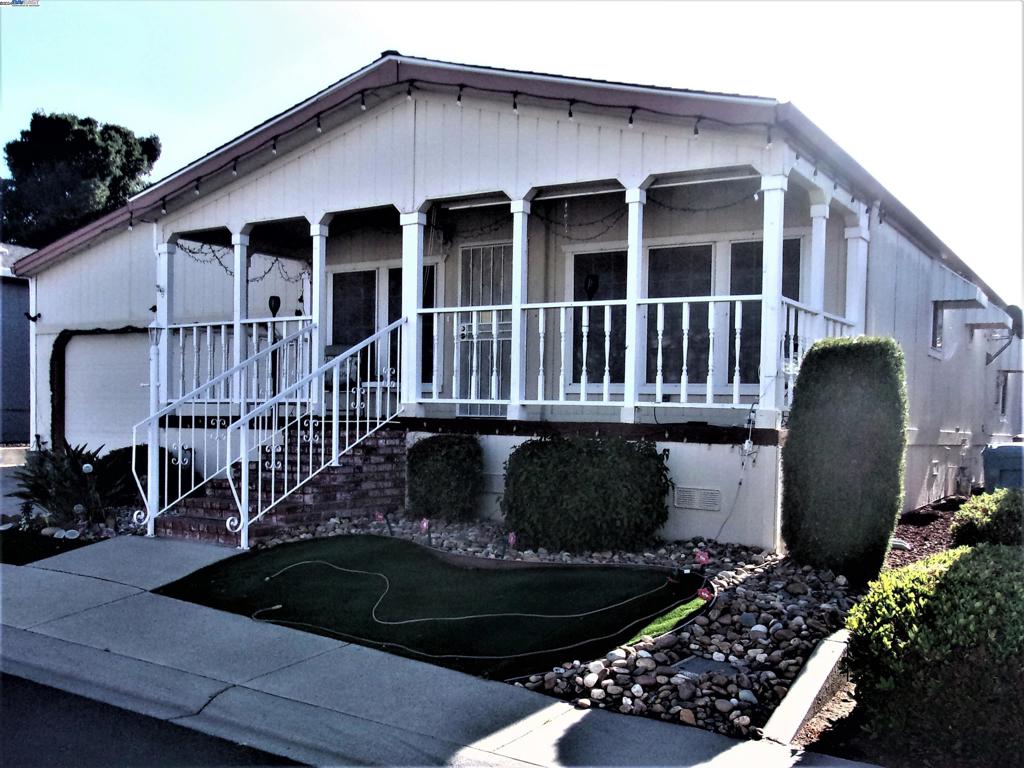 a front view of a house with balcony