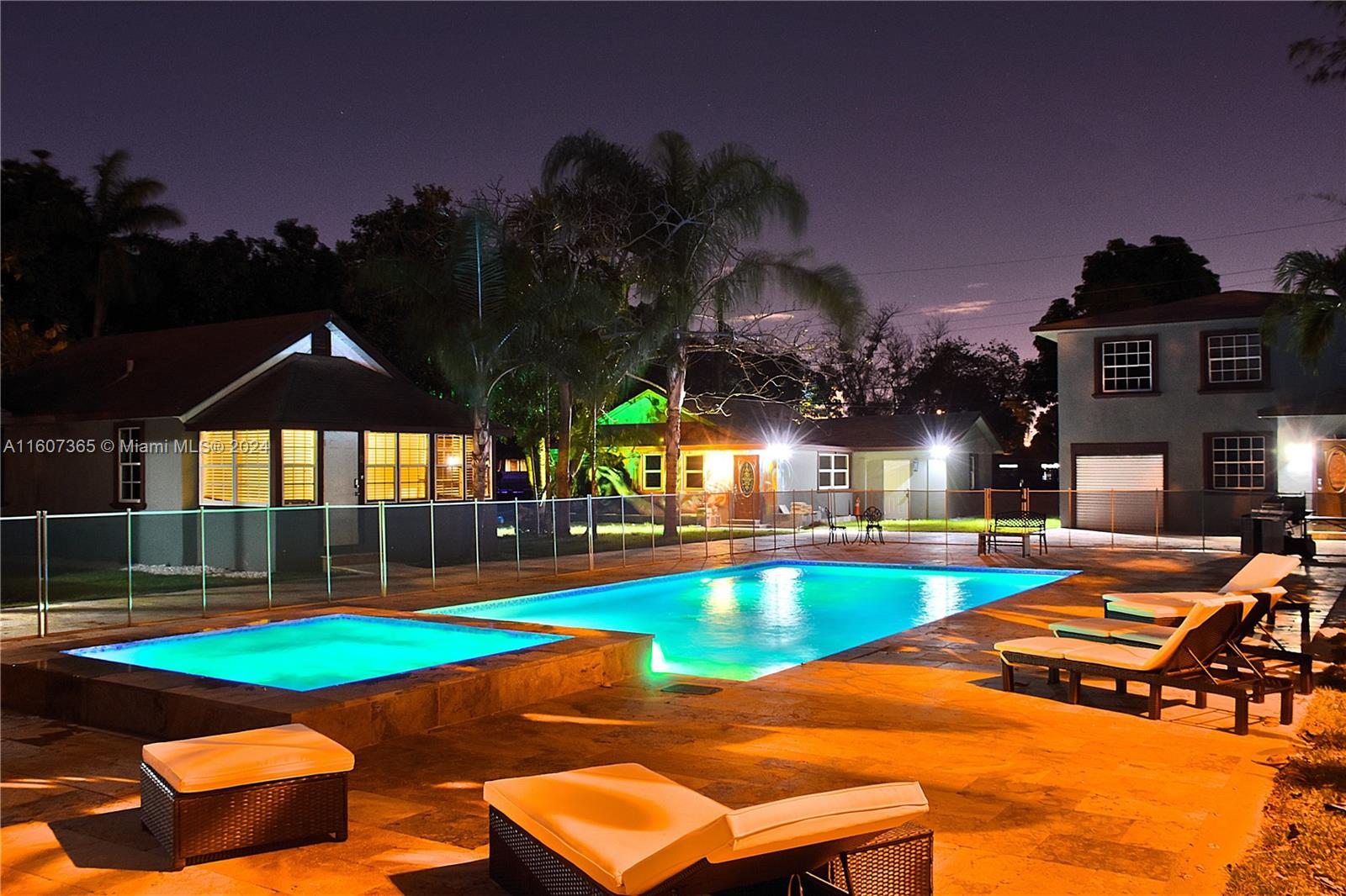 a view of swimming pool with lounge chair