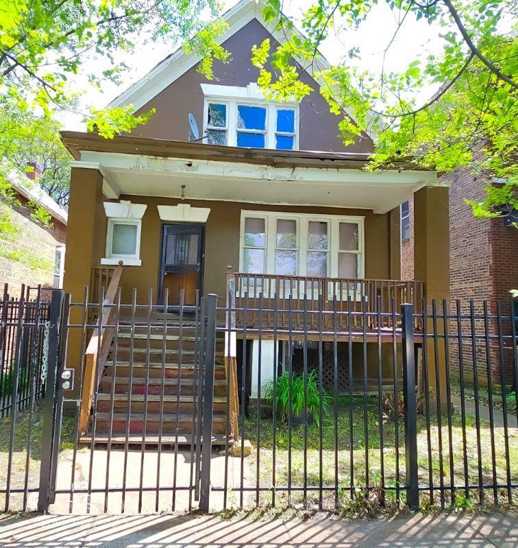 a front view of a house with a porch