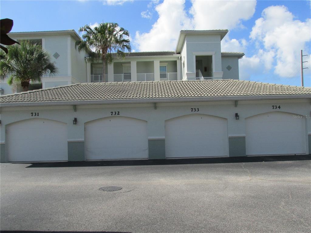 a view of a house with a garage