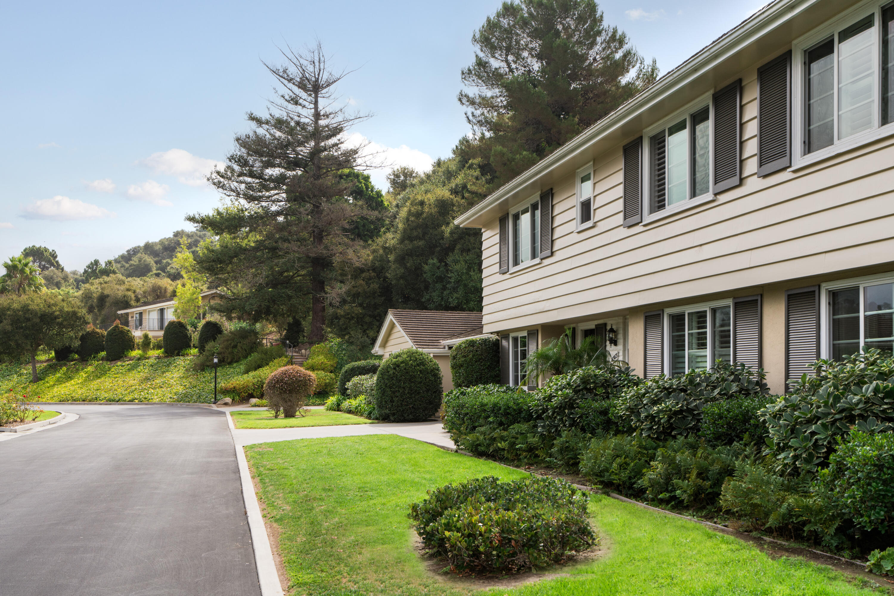 a house view with a garden space