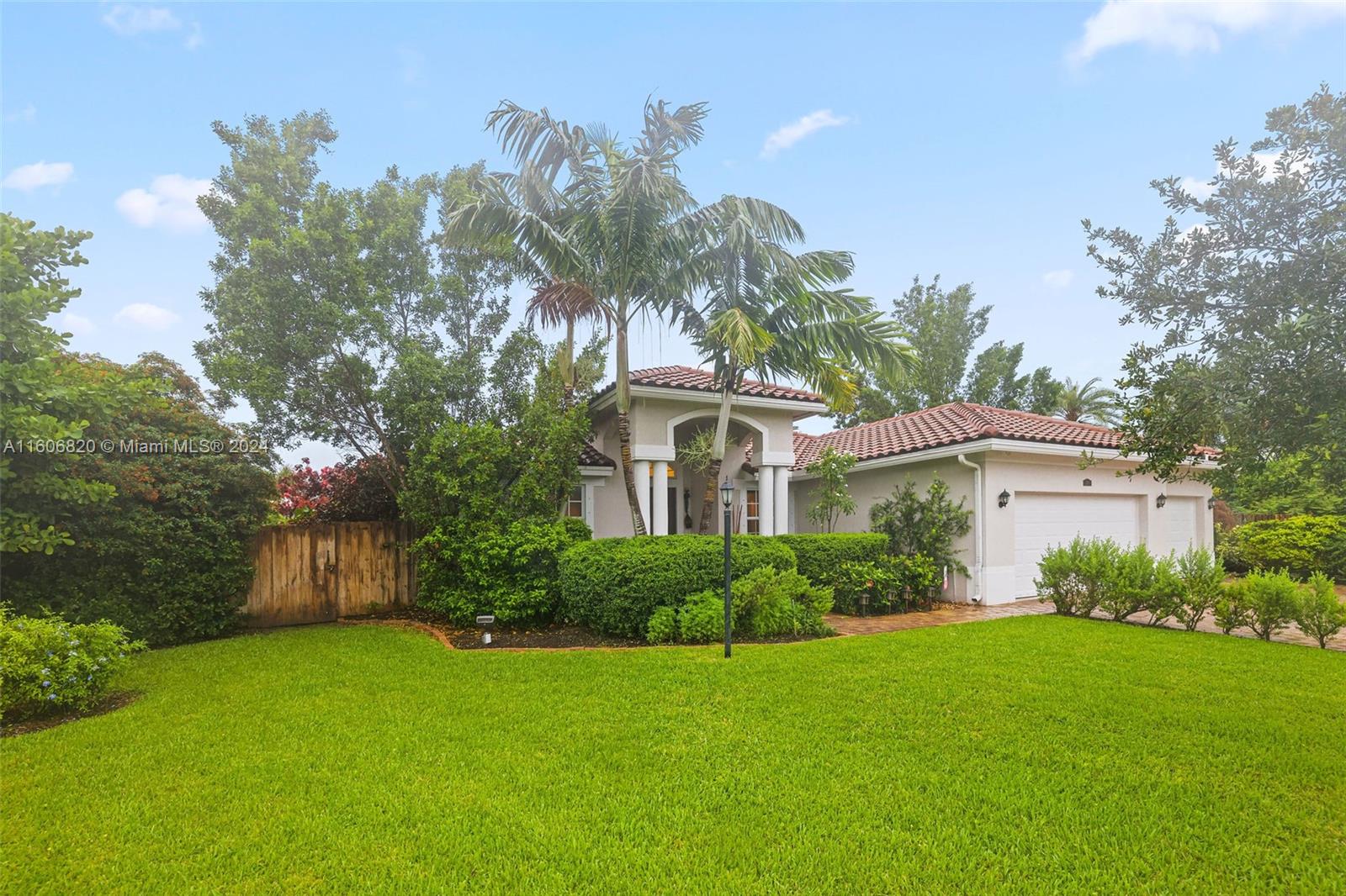 a house view with a garden space