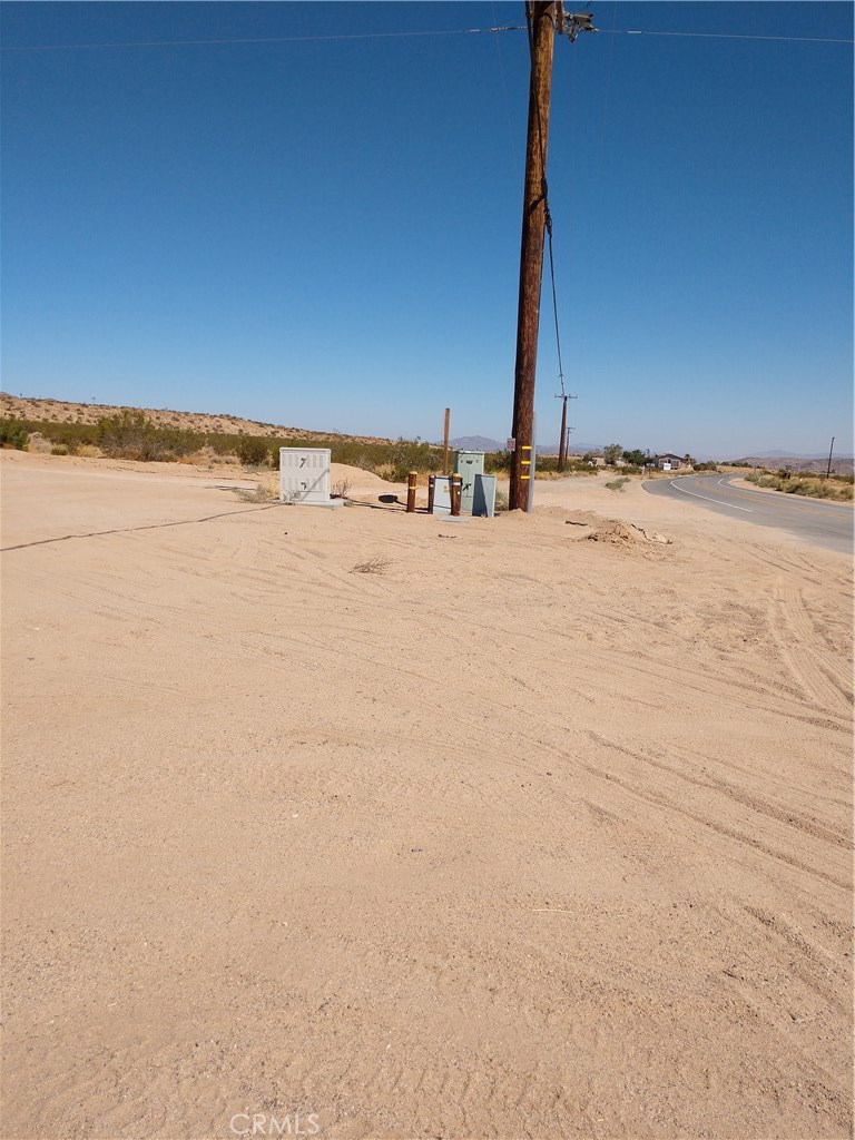 a view of a ocean with a building in the background