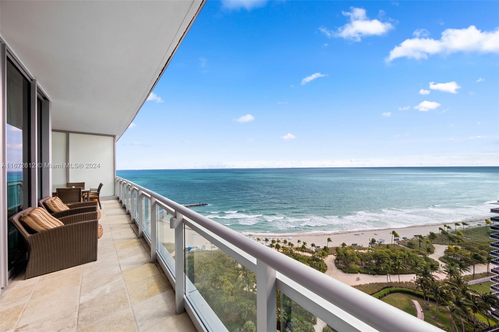 a view of city and ocean from balcony