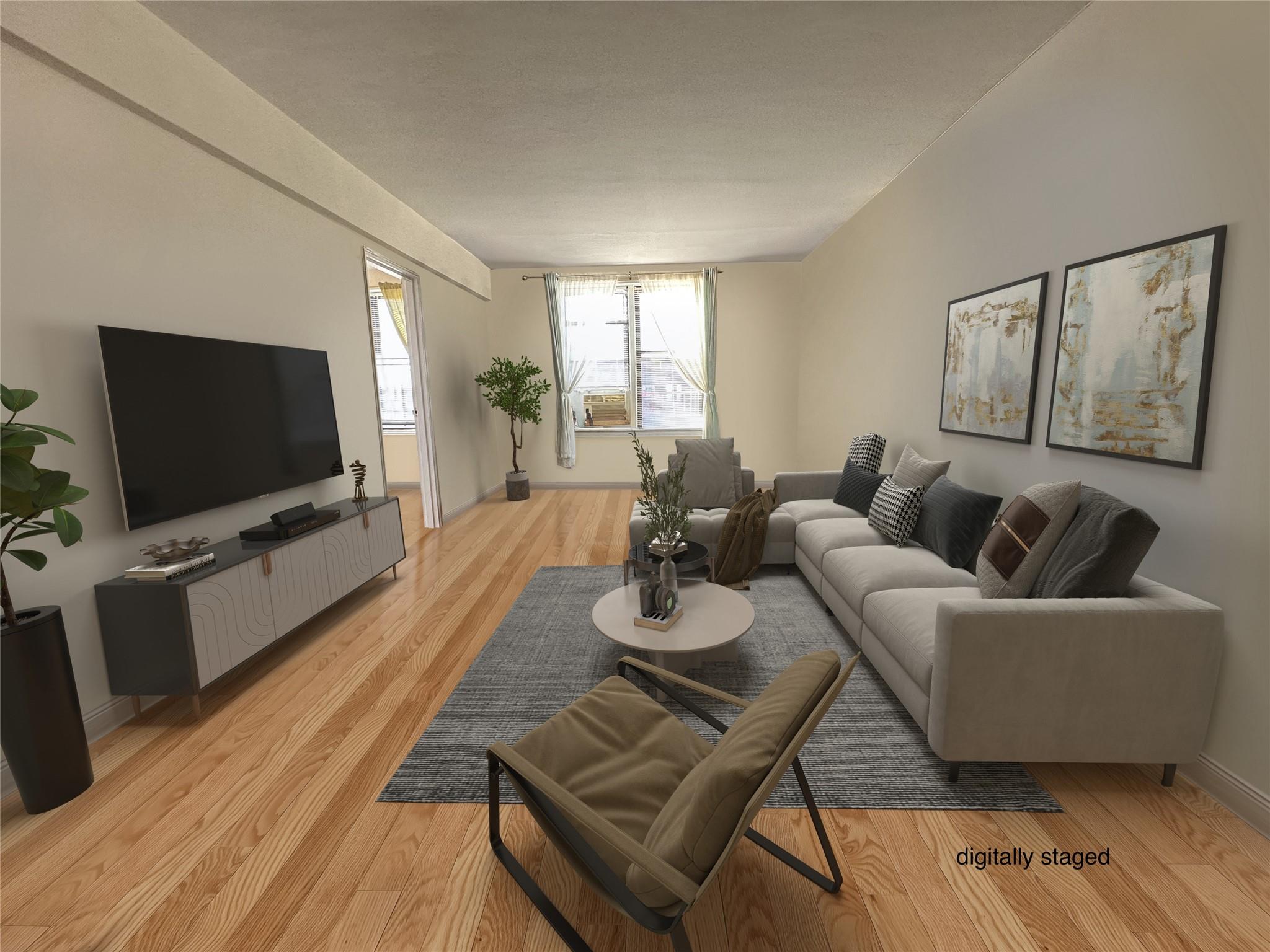 Living room featuring light hardwood / wood-style flooring