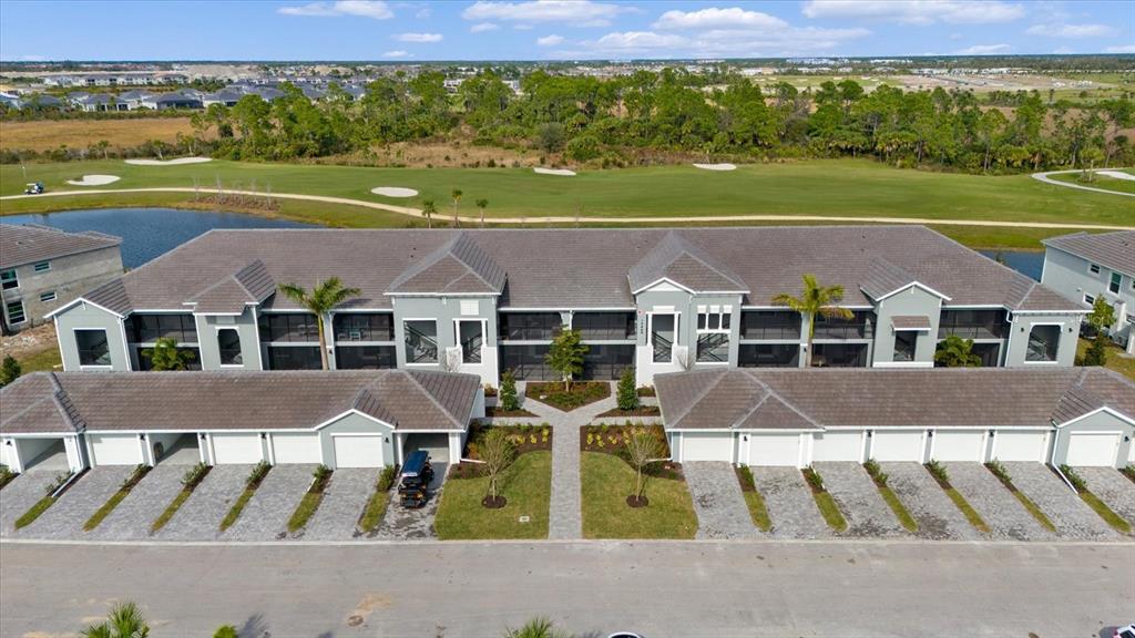 an aerial view of a house with a garden