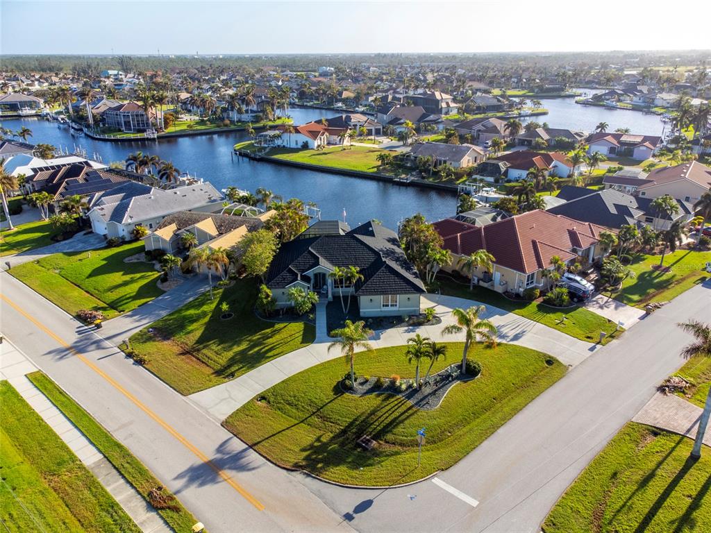 an aerial view of a house with a ocean view