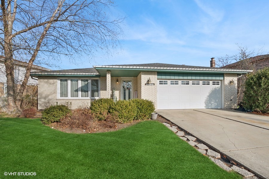 front view of house with a yard