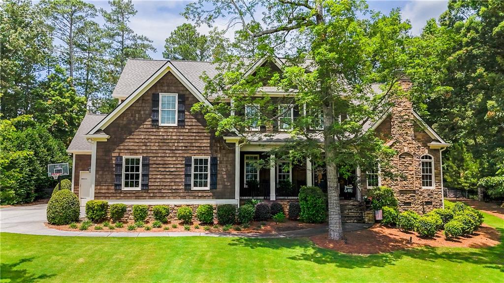 front view of a house with a yard