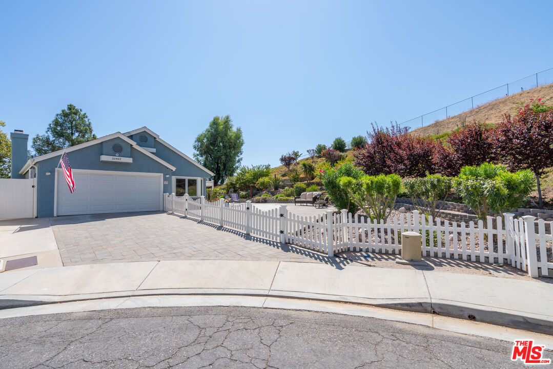 a house view with a outdoor space