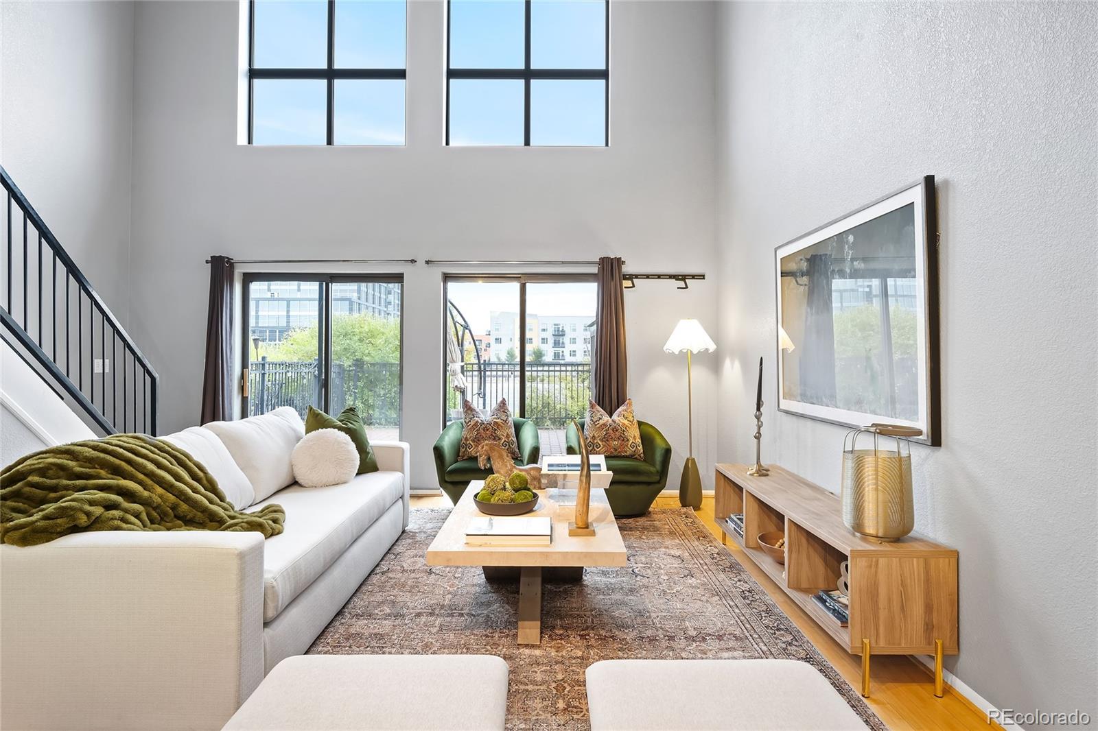 a living room with furniture and a table