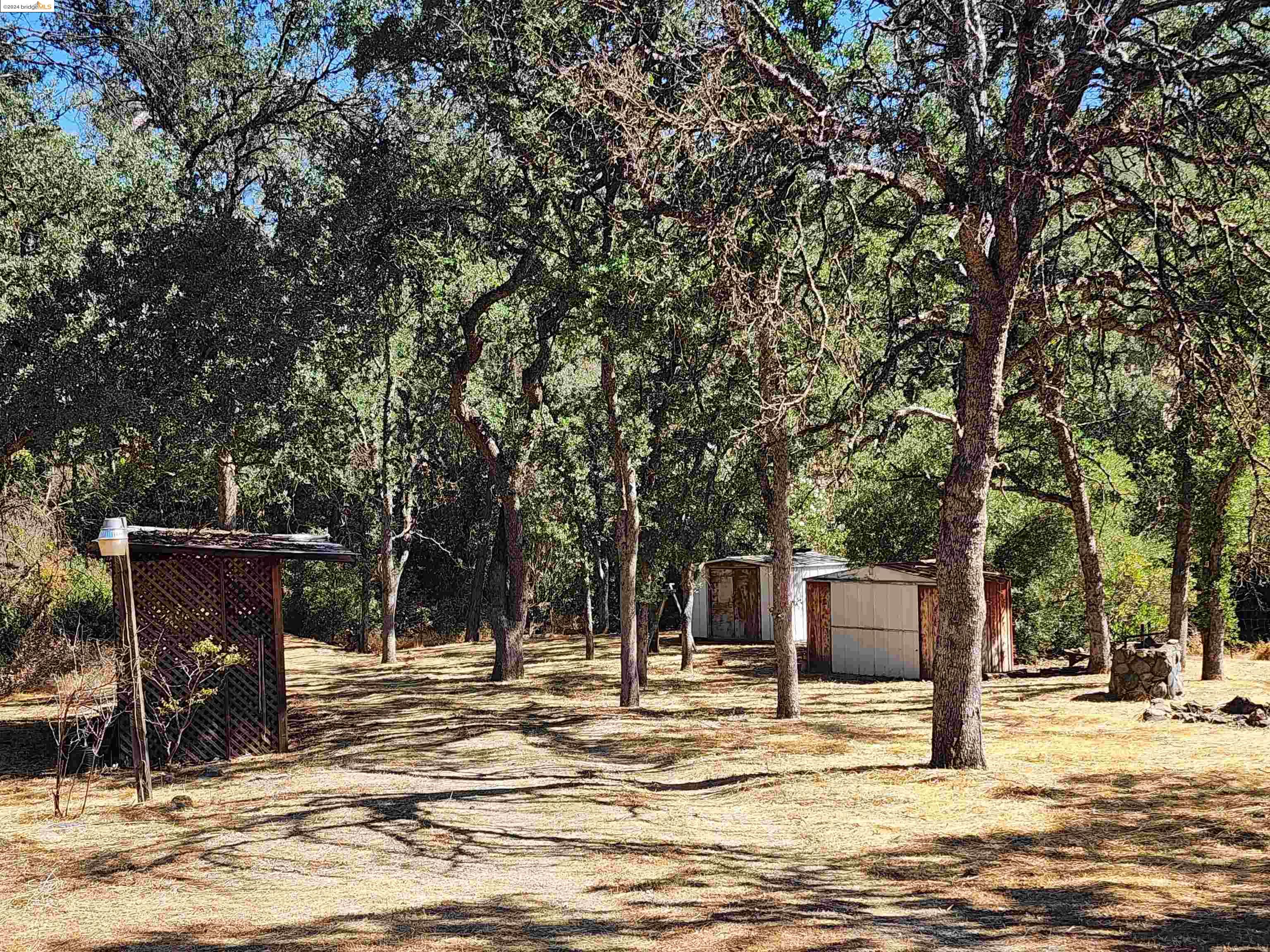 a view of outdoor space with deck and kitchen