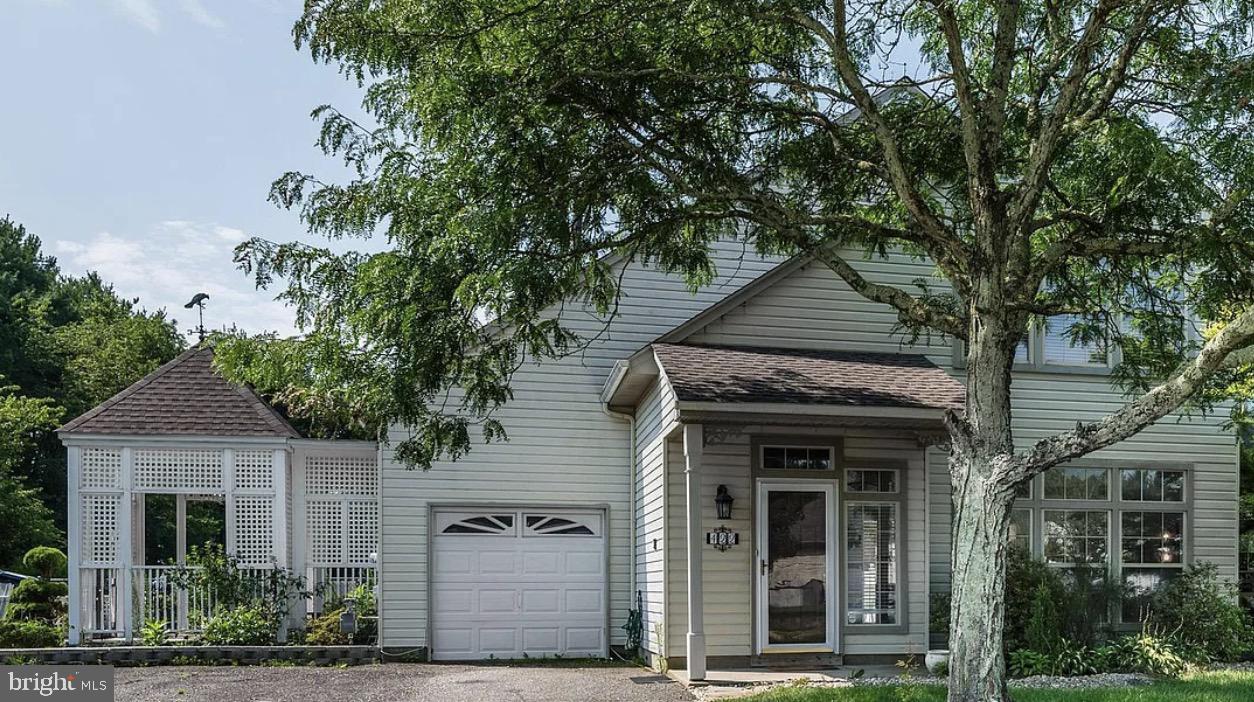 front view of a house with a small yard