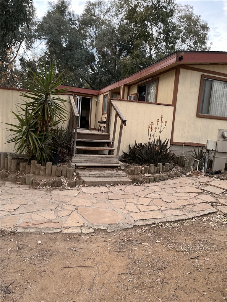 18100 HONEY LANE LAKE ELSINORE CA VIEW OF FRONT OF HOME WITH STEPS