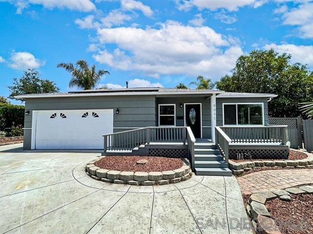 front view of a house with a patio