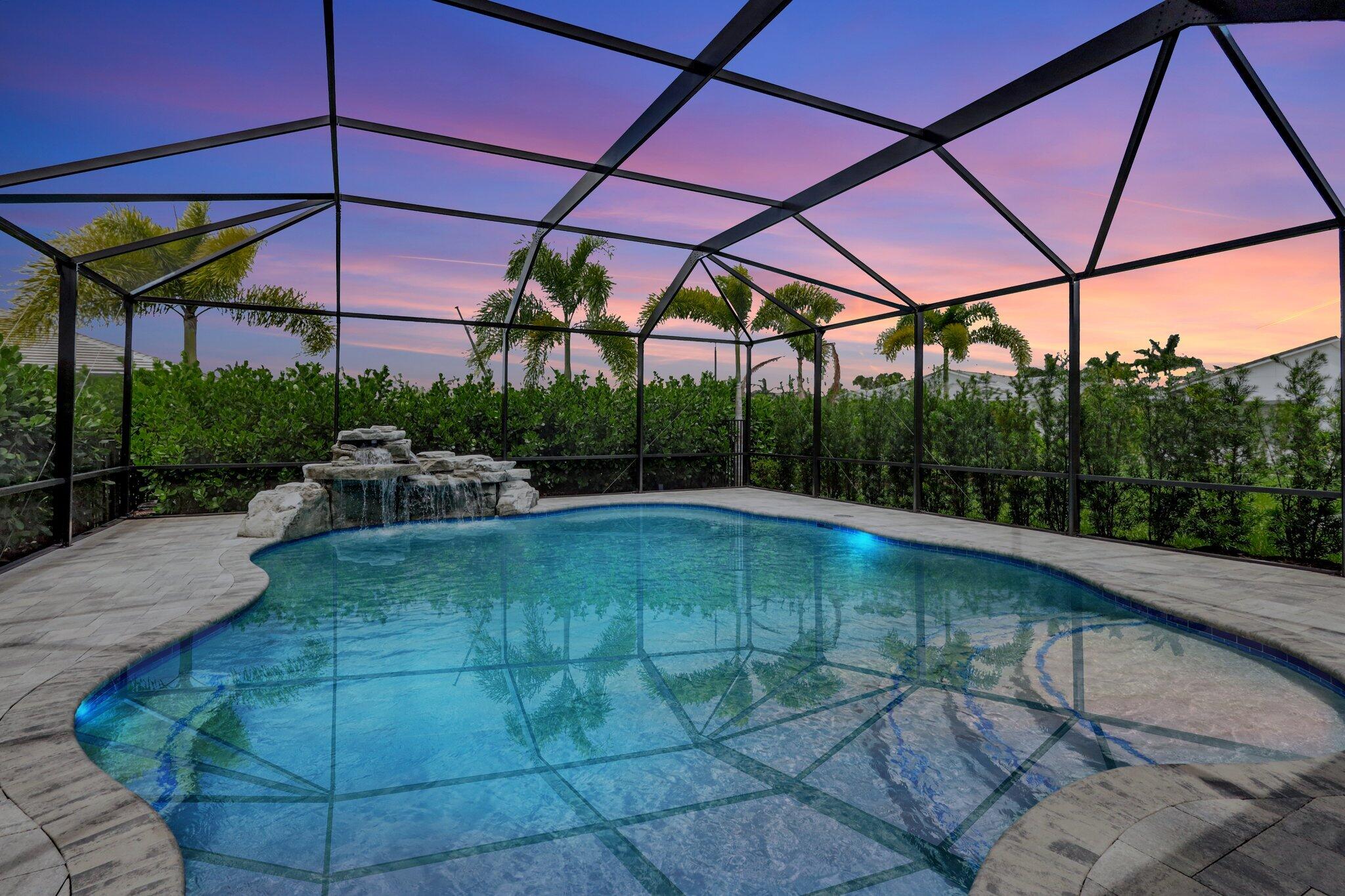 a view of a swimming pool with a patio