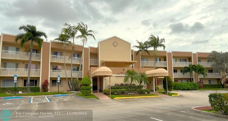 a front view of a building with street view