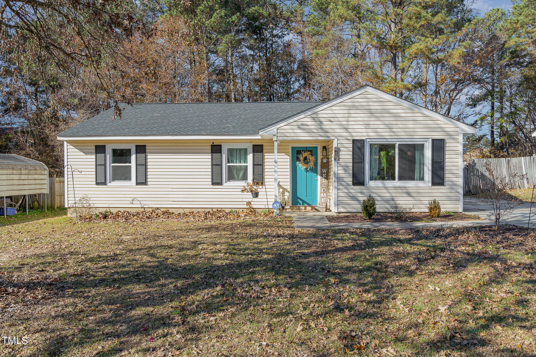 a front view of a house with yard