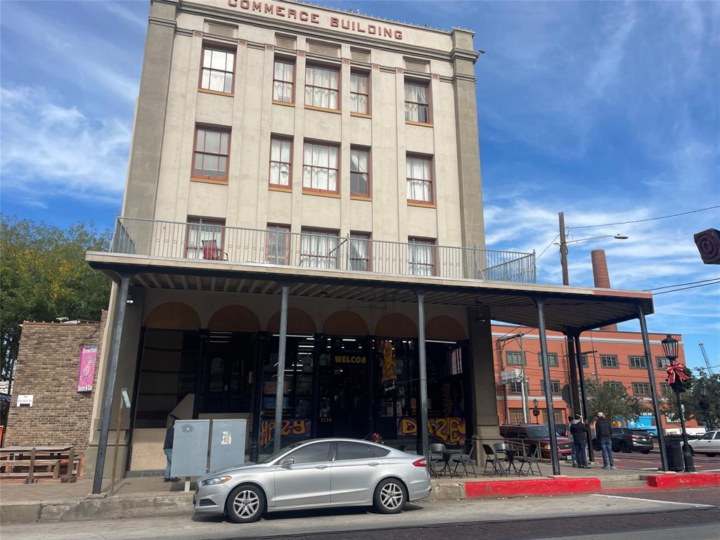 a car parked in front of a building