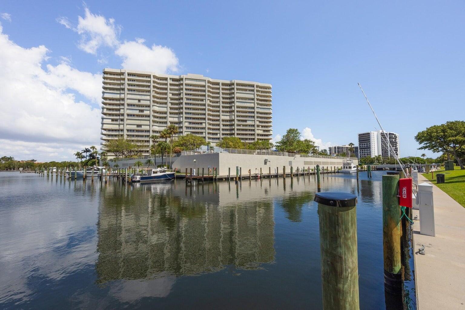 a view of a lake with tall buildings