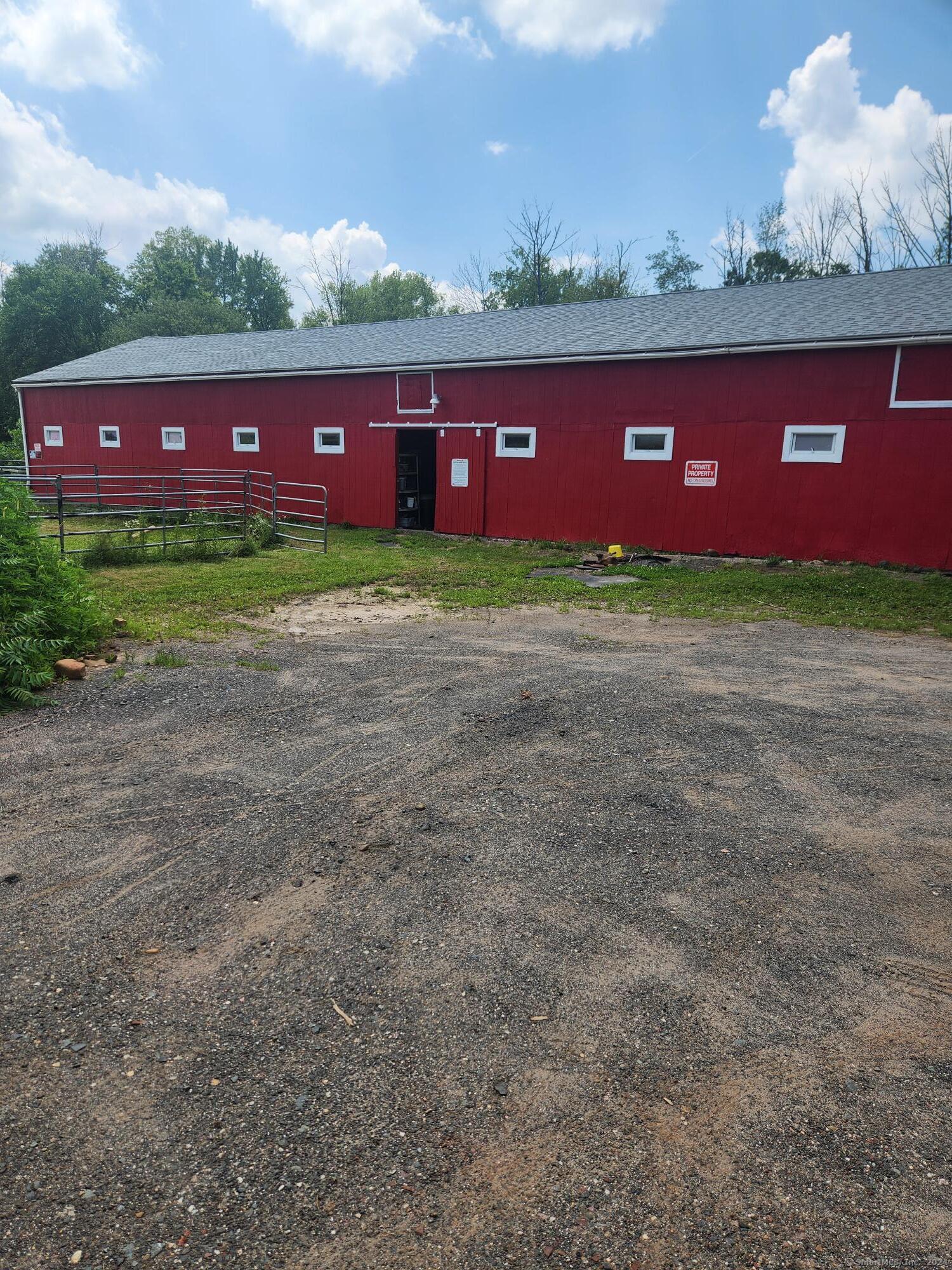 a view of a building with a yard