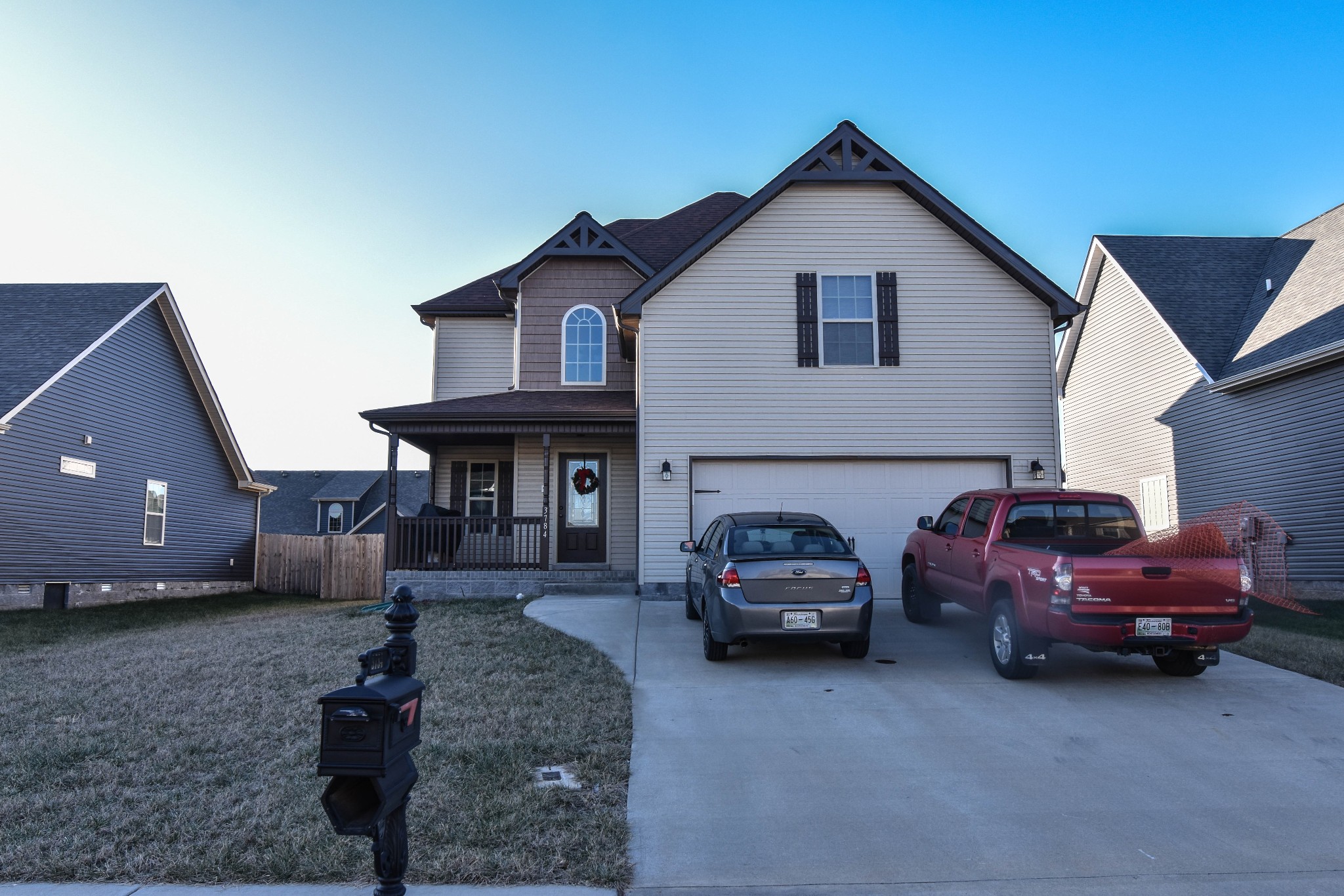 a car parked in front of a house