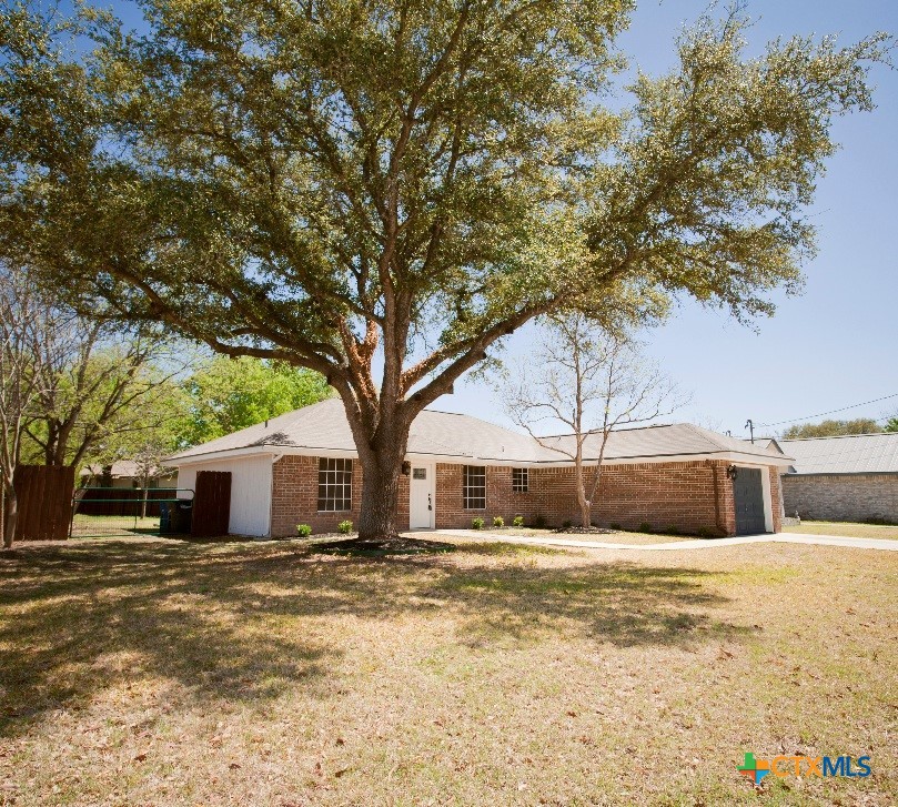 a house with trees in front of it