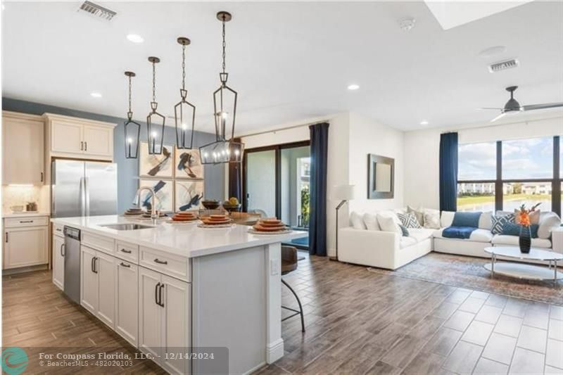 a view of living room with granite countertop furniture and fireplace