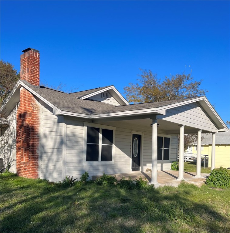 View of front facade featuring a porch and a front