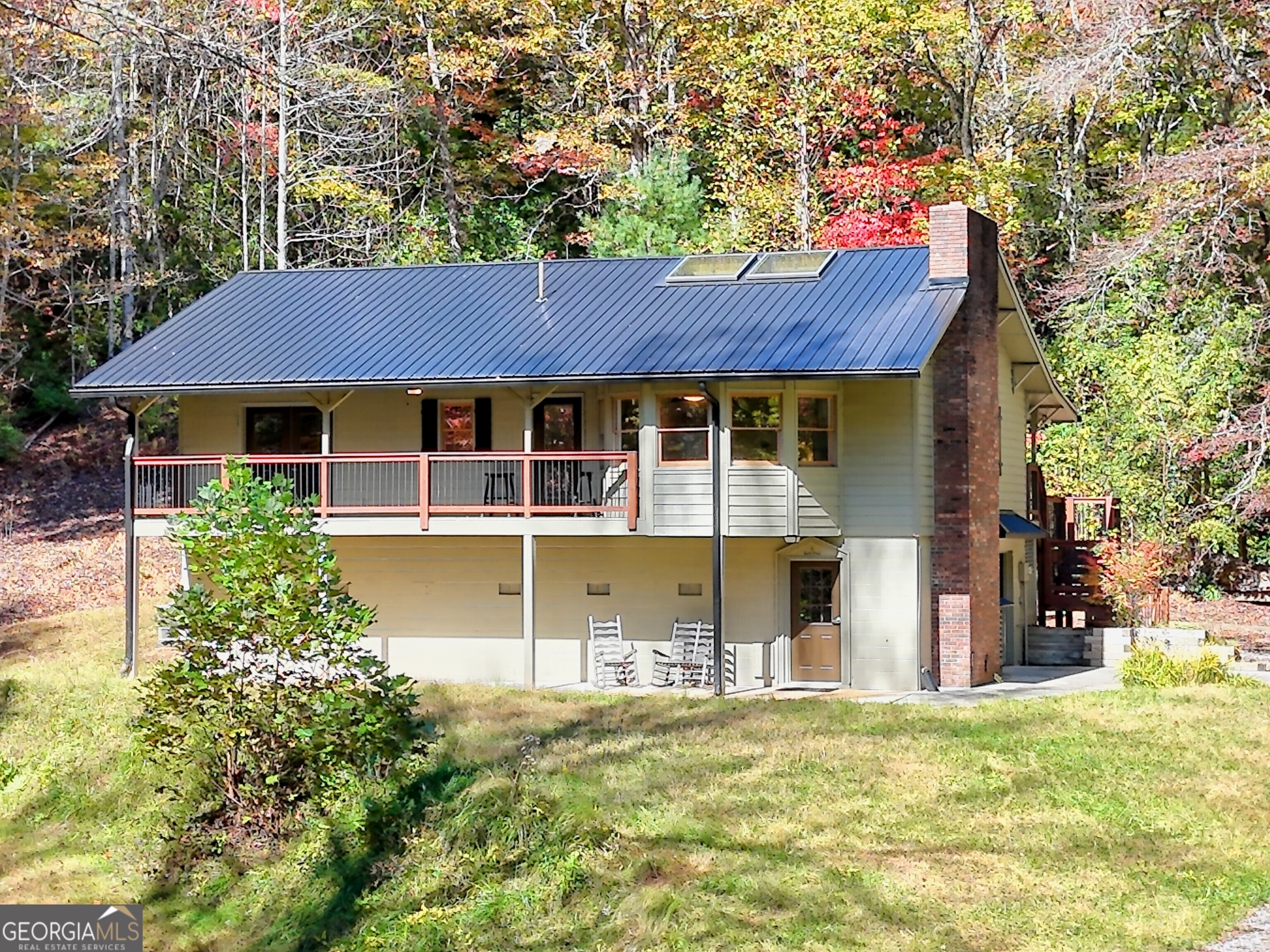 a view of a house with a swimming pool