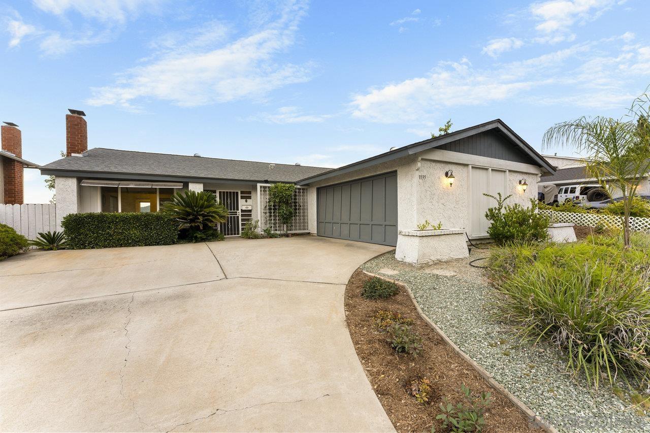 a house view with a outdoor space