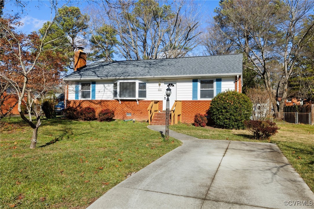 front view of a house with a yard