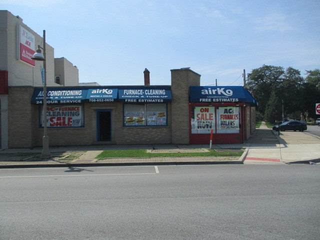 a view of a building with a street