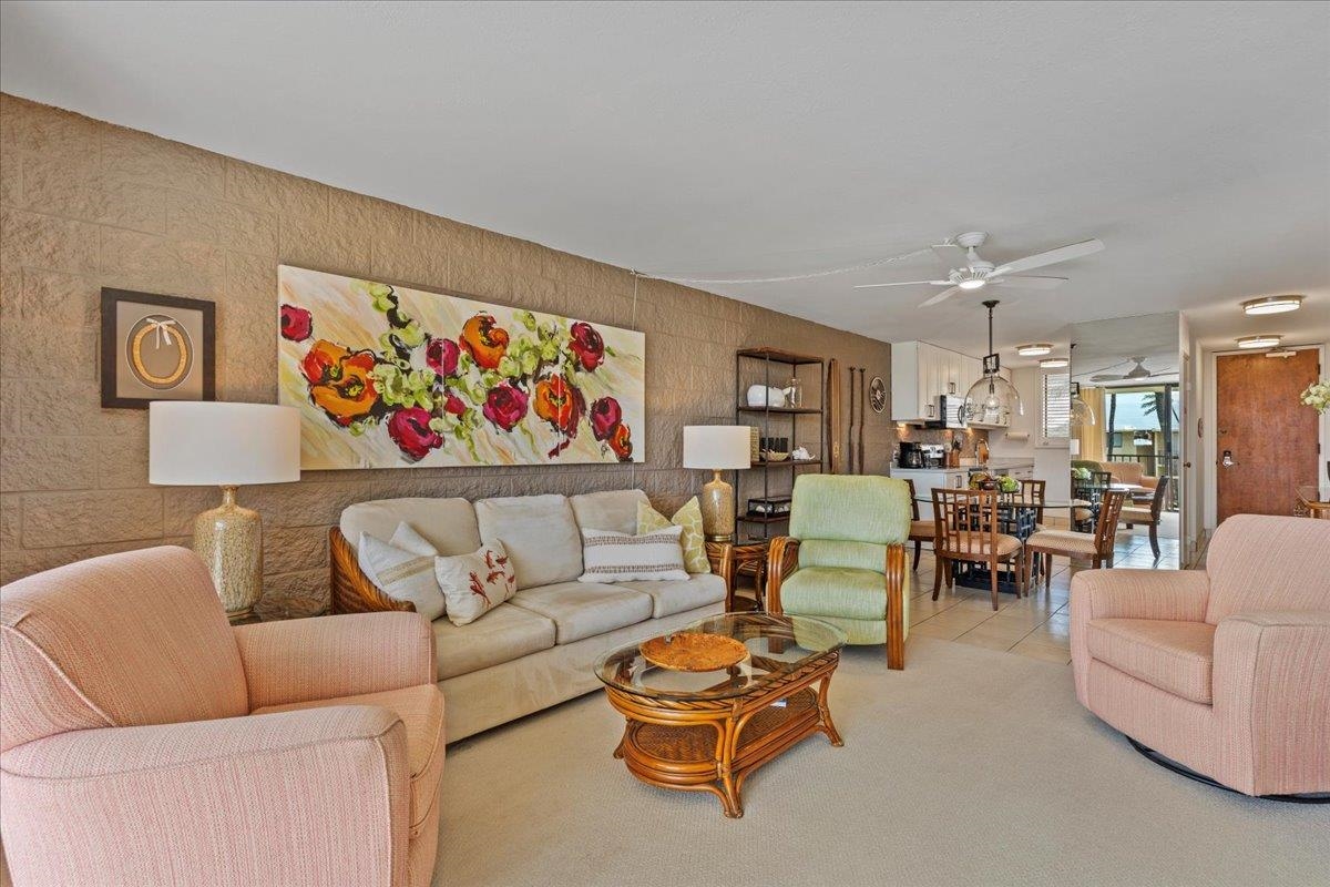 a living room with furniture and a table