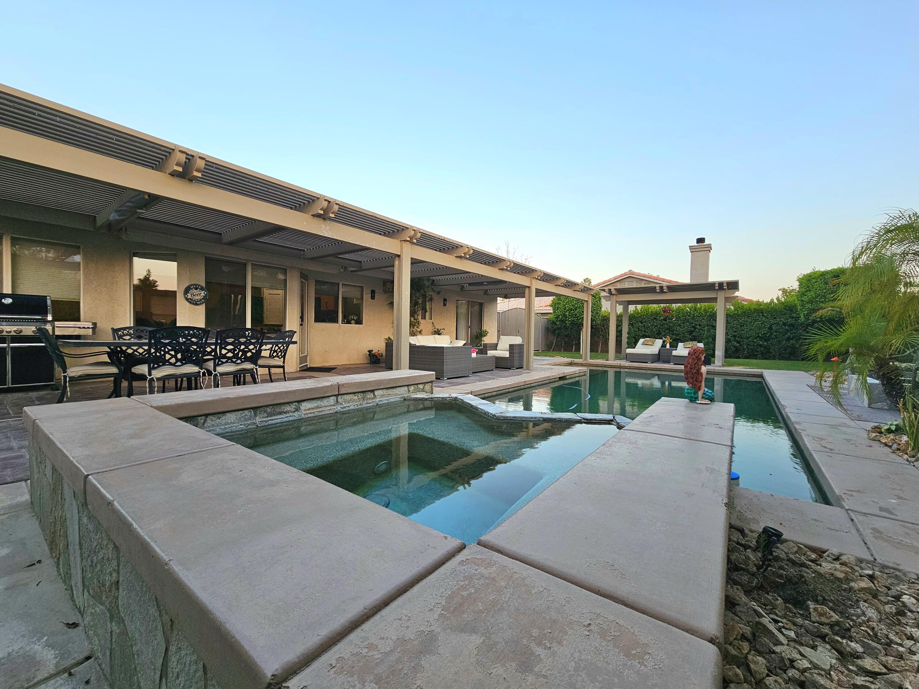 a view of a house with sitting area