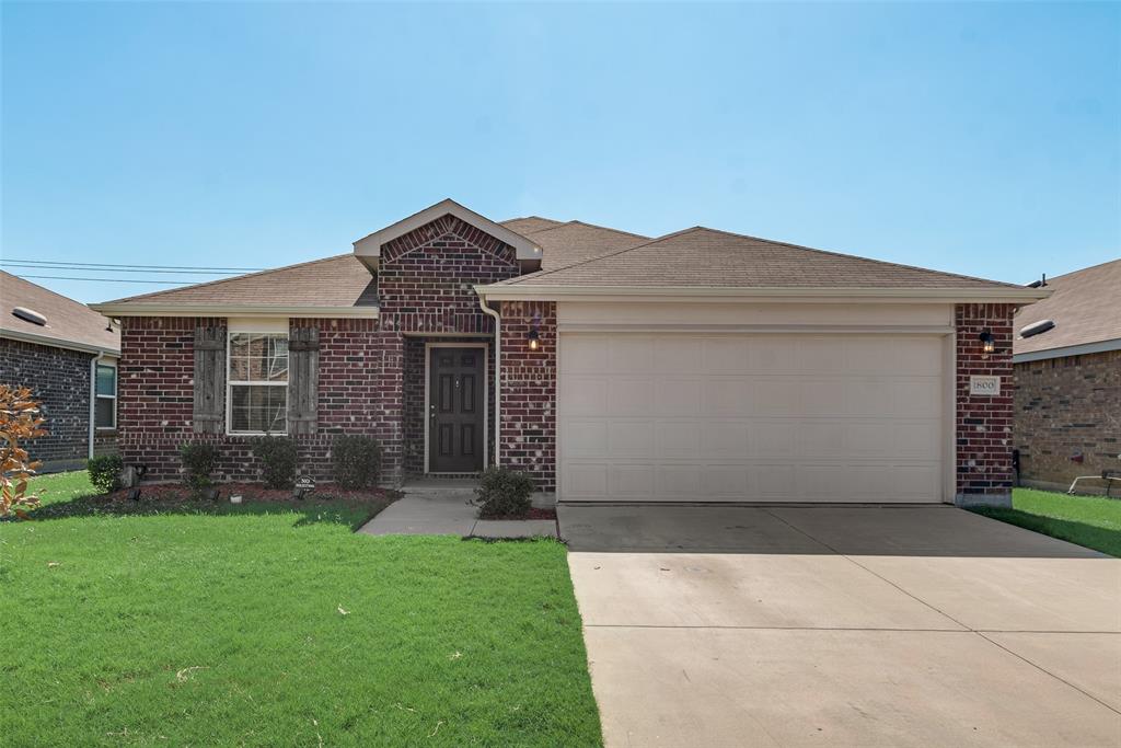 front view of house with a yard