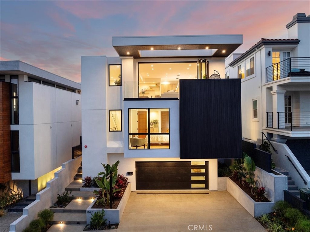 a front view of a house with a garage