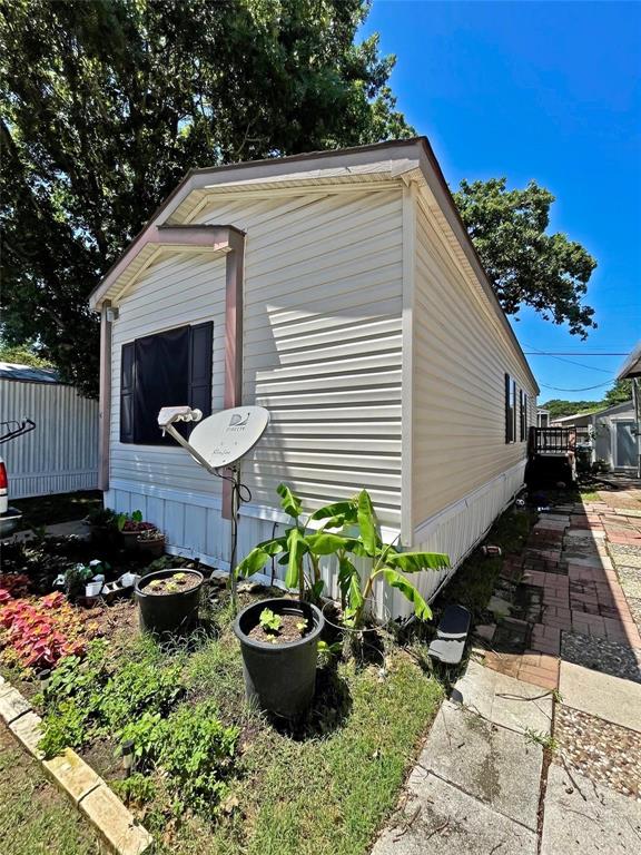 a view of a back yard of the house