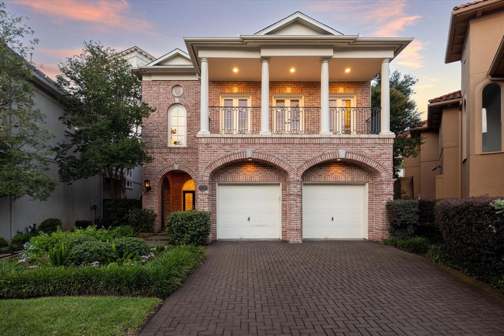 a front view of a house with yellow lighting