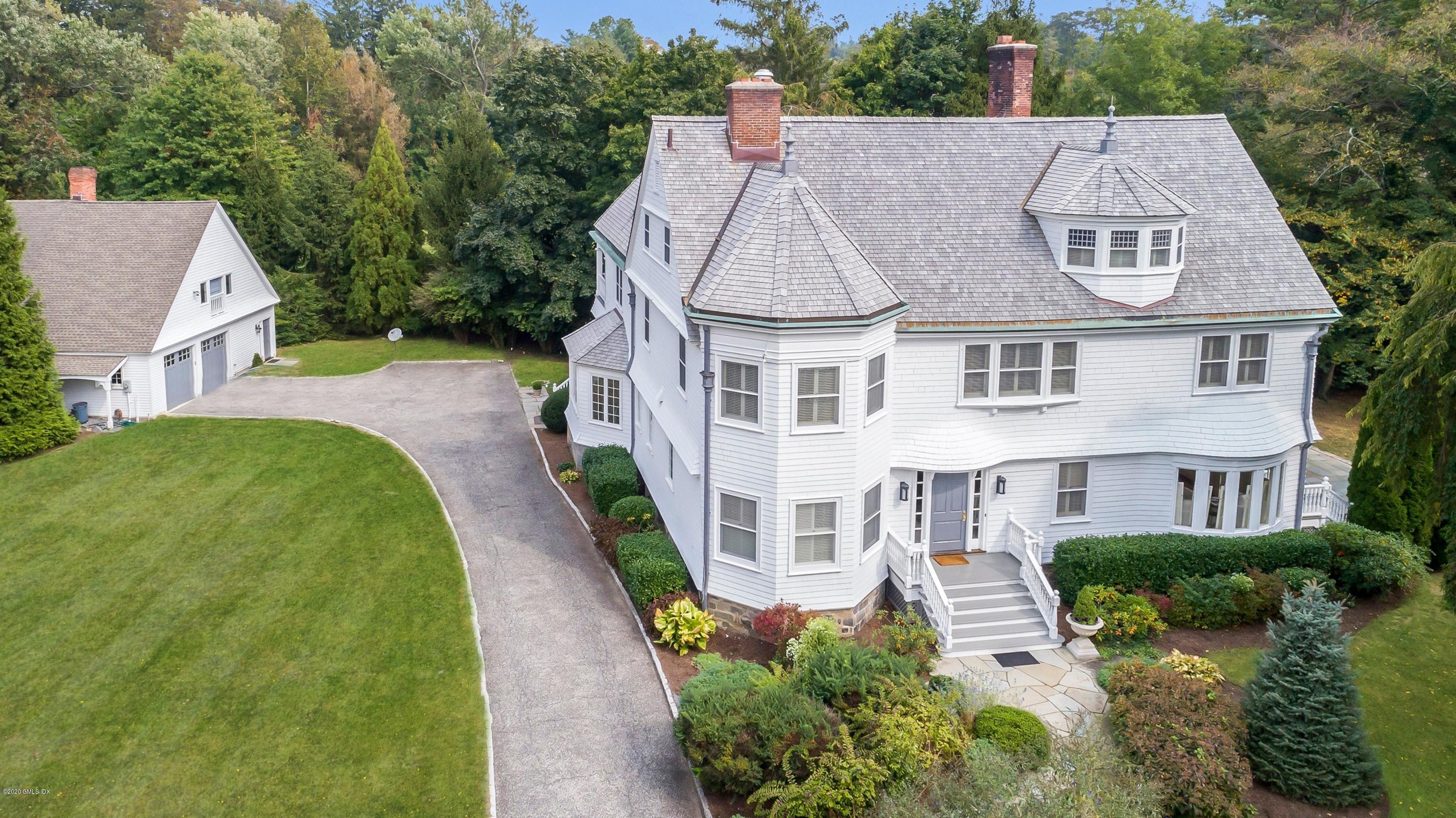 an aerial view of a house with a garden