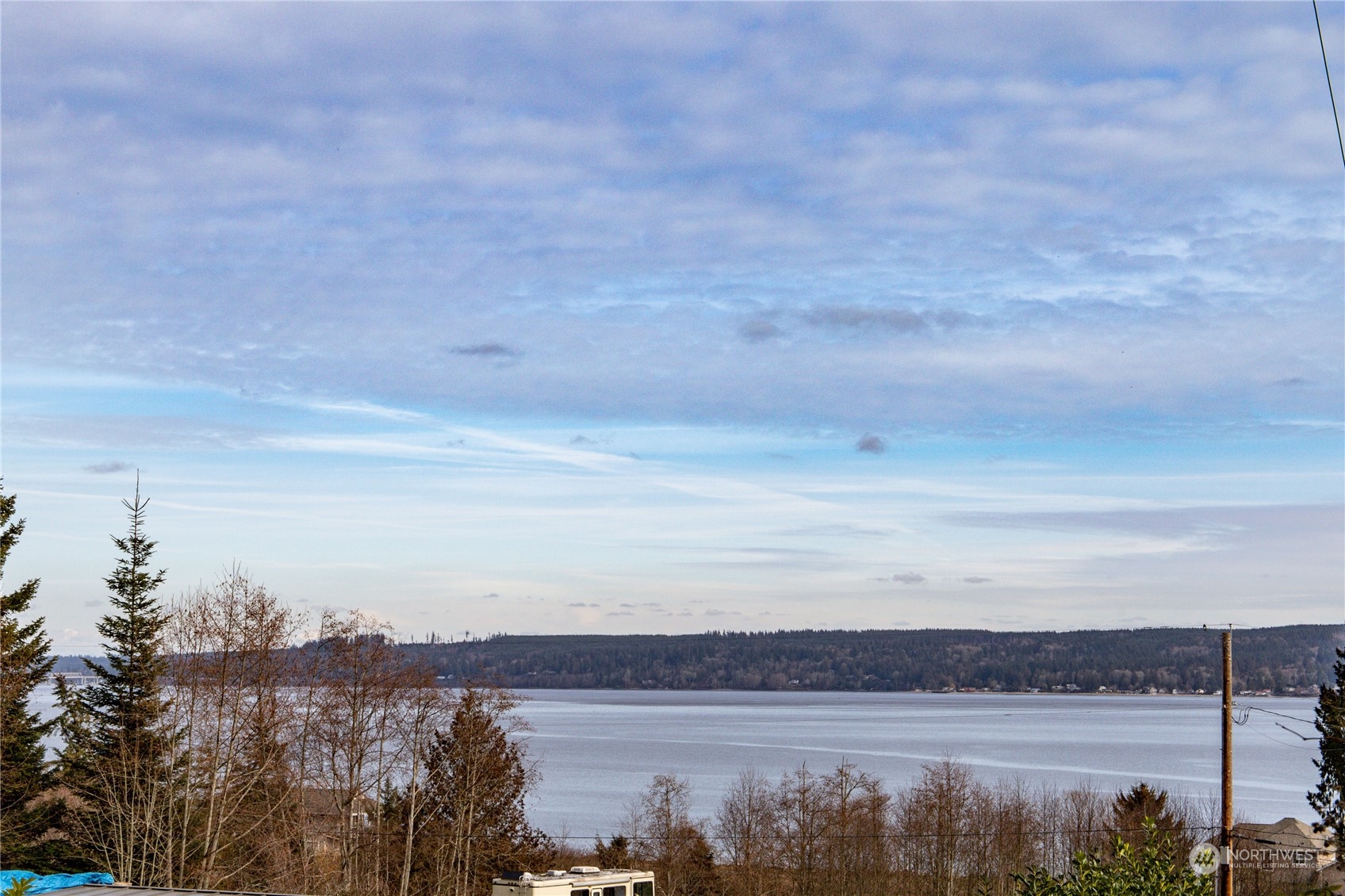 a view of lake with mountain in the back