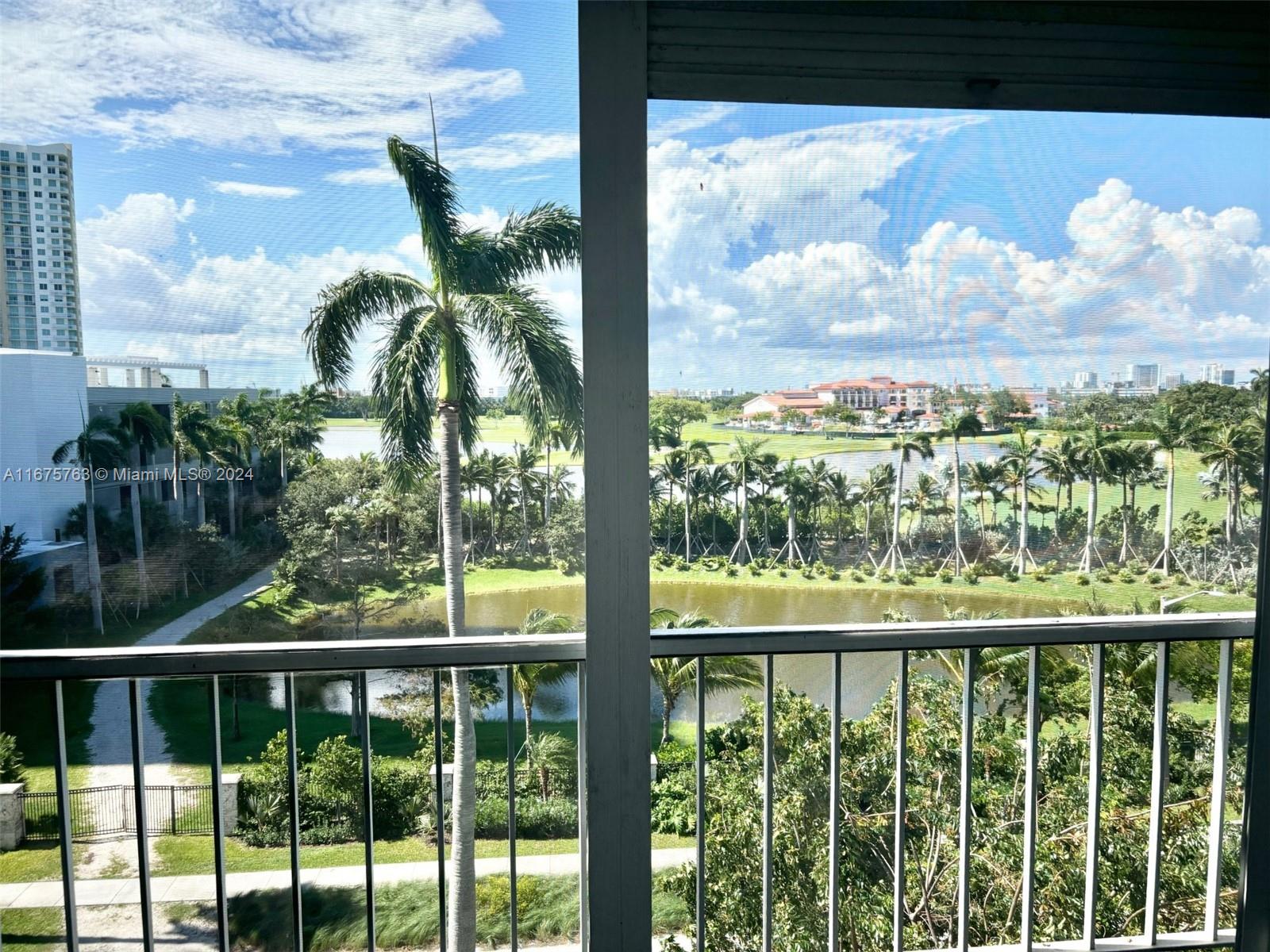 a view of a lake from a balcony