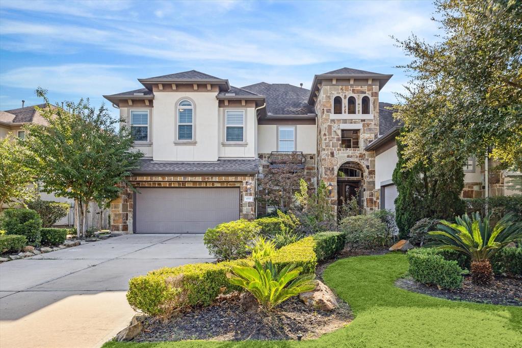 Stately executive home on a lakefront lot with a rare front lake view.  This immaculate home offers 4 (possible 5) bedrooms, 3.5 bathrooms, open-concept living and entertaining space.