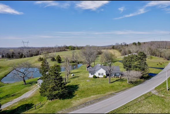 an aerial view of a house with a garden