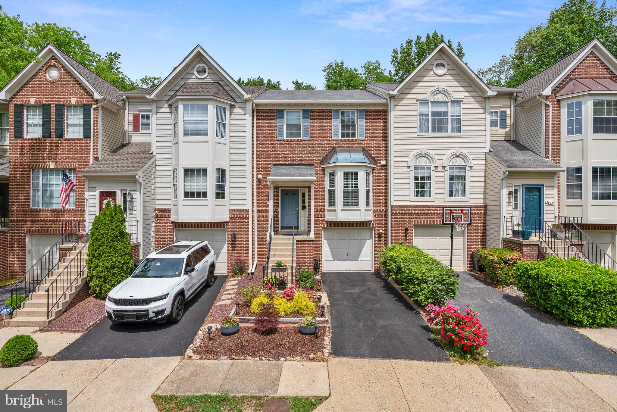 a front view of a house with outdoor space