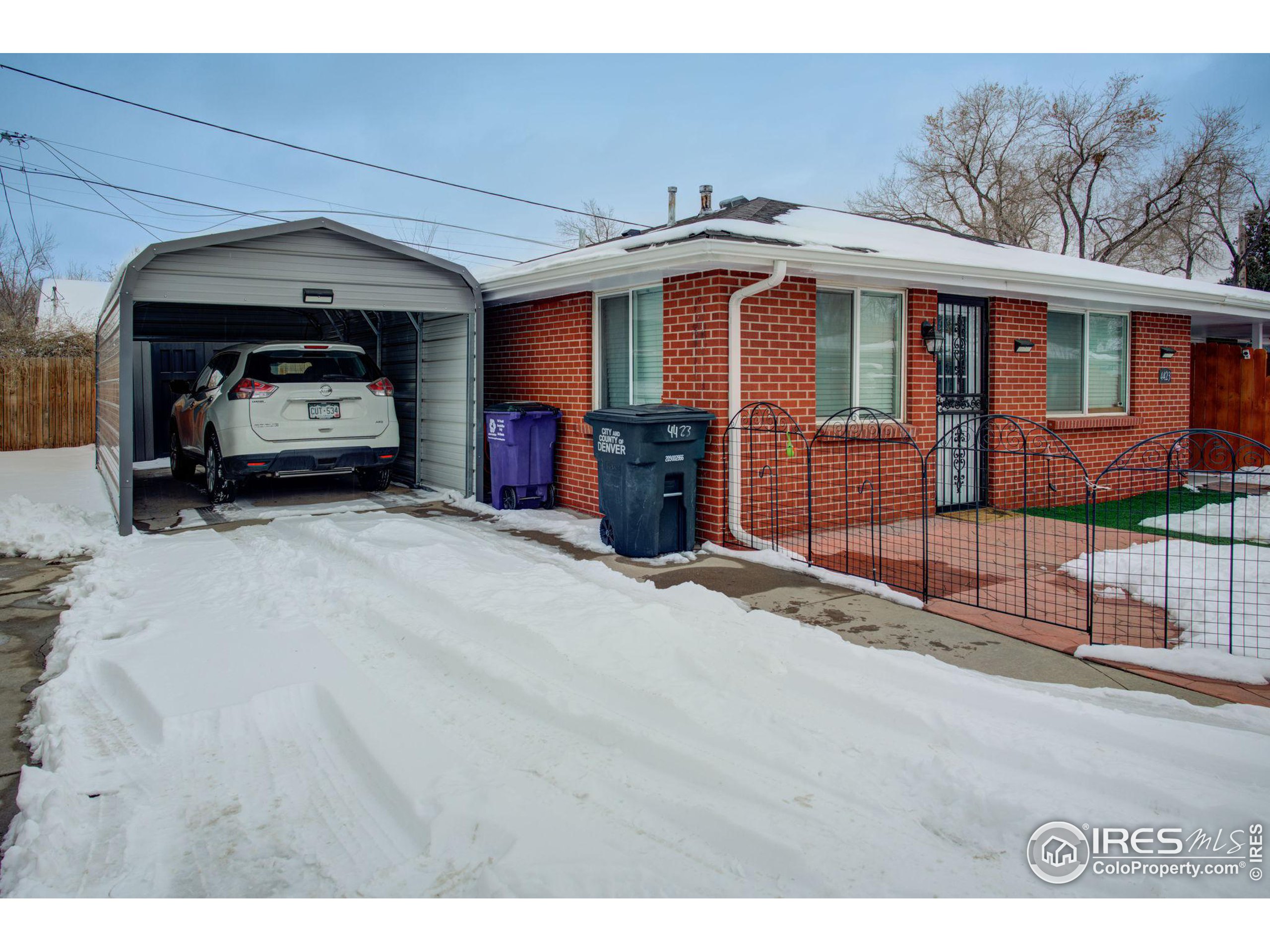 a front view of a house with a garage